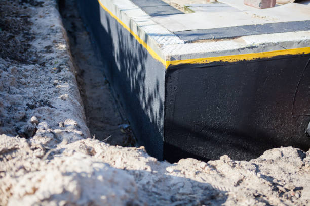 Professional Waterproofing technician working in Batavia, OH